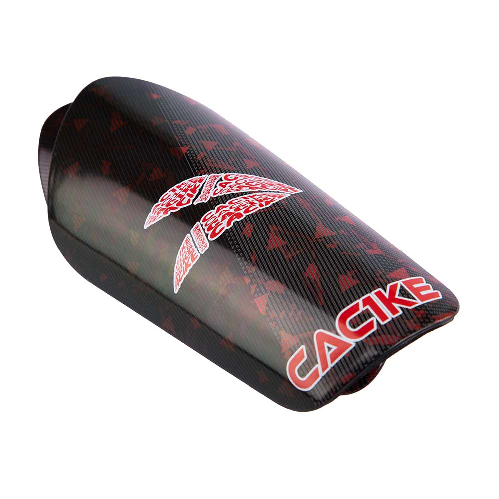 CANILLERAS DE FUTBOL CAC1KE PLUMA NEGRO-ROJO