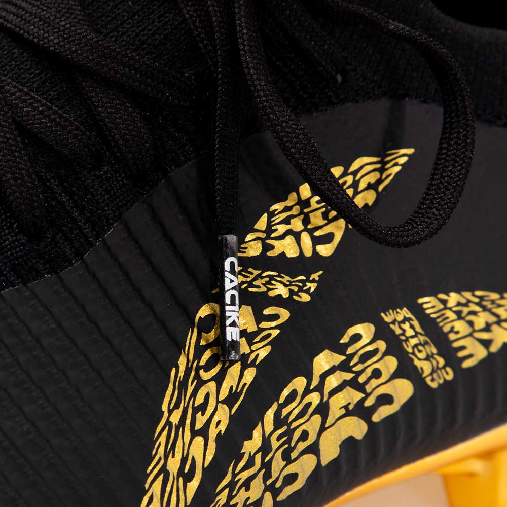 ZAPATILLAS FUTBOL WINGS HOMBRE NEGRO-DORADO